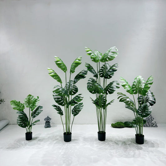 Имитированное растение, поддержанное черепахой, бамбуковое растение от пола до пола в горшке в гостиной